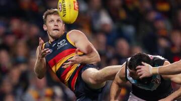 A series of eye injuries have brought an immediate end to Rory Sloane's AFL career at Adelaide. (Matt Turner/AAP PHOTOS)