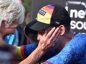 Sam Appleton celebrates his Ironman Australia victory with his mum, who resides in Port Macquarie. Picture by Ruby Pascoe